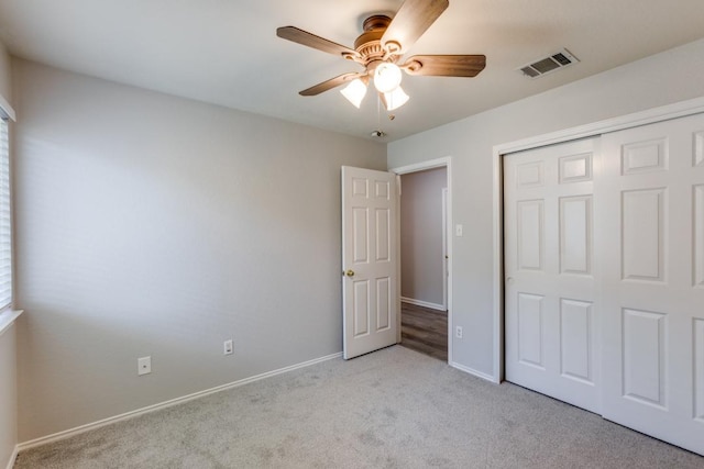 15737 Cadoz Dr, Austin, TX 78728 - unfurnished bedroom with light colored carpet, a closet, and a ceiling fan