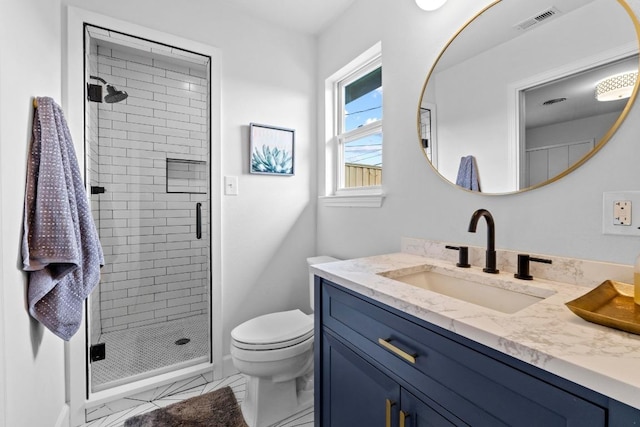 1909 Belford Dr, Austin, TX 78757 - bathroom featuring marble finish flooring, vanity, and a stall shower