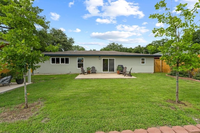 1909 Belford Dr, Austin, TX 78757 - back of property with a patio area