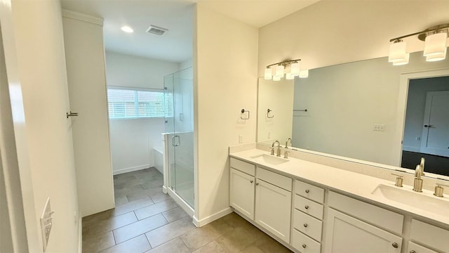 6800 Menchaca Rd Unit 31, Austin, TX 78745 - full bathroom featuring double vanity, tile patterned flooring, a shower stall, and a tub