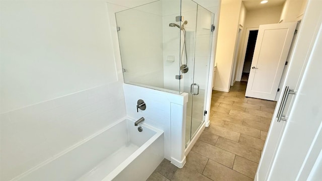 6800 Menchaca Rd Unit 31, Austin, TX 78745 - full bathroom with a bath, a shower stall, and tile patterned floors
