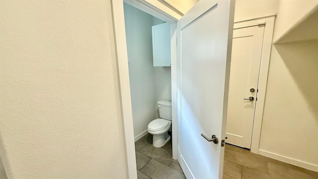6800 Menchaca Rd Unit 31, Austin, TX 78745 - bathroom with toilet and tile patterned flooring