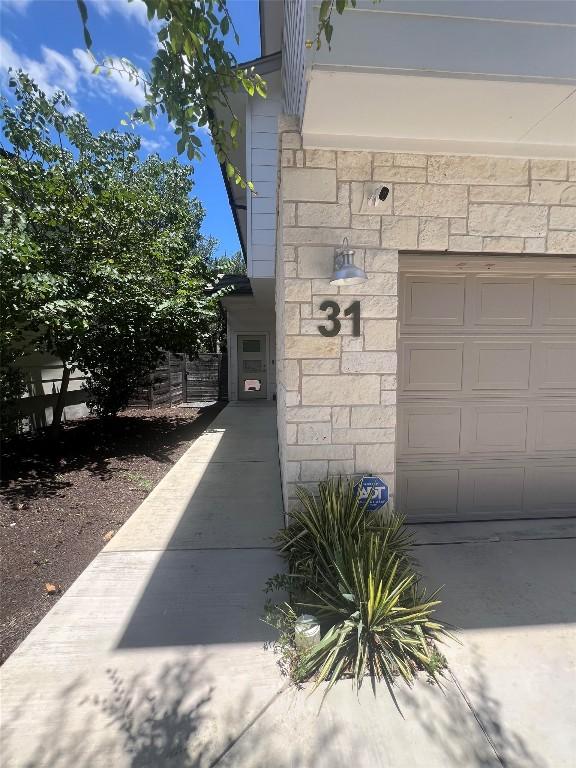 6800 Menchaca Rd Unit 31, Austin, TX 78745 - exterior view of stone siding