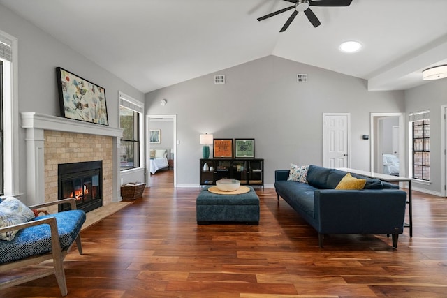 5812 Abilene Trl, Austin, TX 78749 - living room with ceiling fan, wood finished floors, a fireplace, and high vaulted ceiling