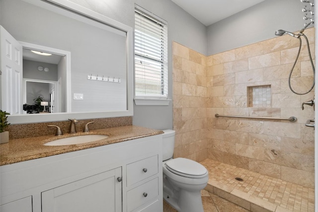 5812 Abilene Trl, Austin, TX 78749 - full bath featuring tiled shower, vanity, and tile patterned floors