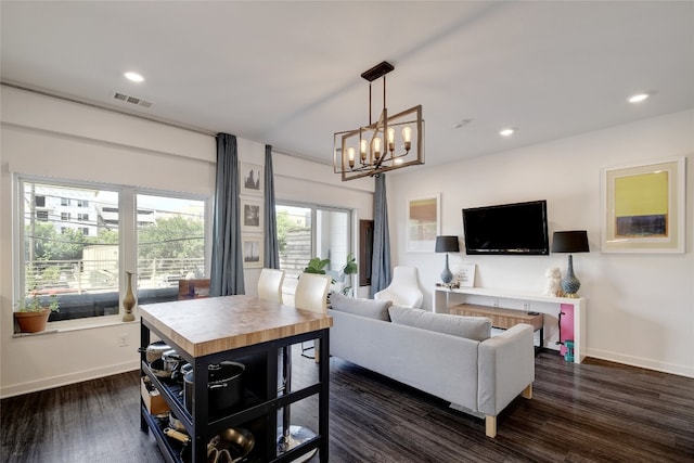 4361 S Congress Ave Unit 126, Austin, TX 78745 - living room with dark wood-style flooring, a chandelier, and recessed lighting