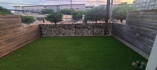 4361 S Congress Ave Unit 126, Austin, TX 78745 - view of yard at dusk