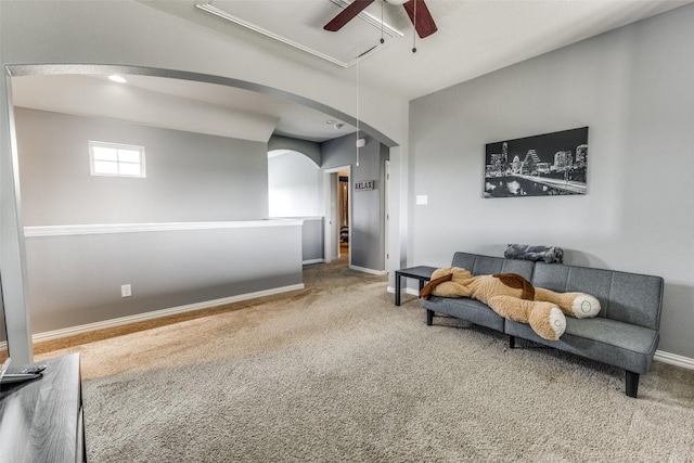 544 Blossom Valley Strm, Buda, TX 78610 - sitting room featuring attic access, ceiling fan, carpet flooring, and arched walkways
