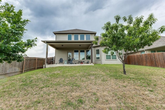 544 Blossom Valley Strm, Buda, TX 78610 - rear view of property featuring a fenced backyard and a patio