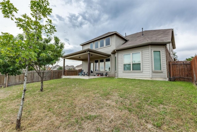 544 Blossom Valley Strm, Buda, TX 78610 - back of house featuring a patio area and a fenced backyard