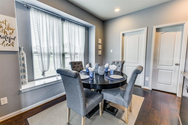 544 Blossom Valley Strm, Buda, TX 78610 - dining space featuring dark wood-style floors and recessed lighting