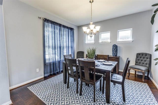 544 Blossom Valley Strm, Buda, TX 78610 - dining room featuring a chandelier and wood finished floors
