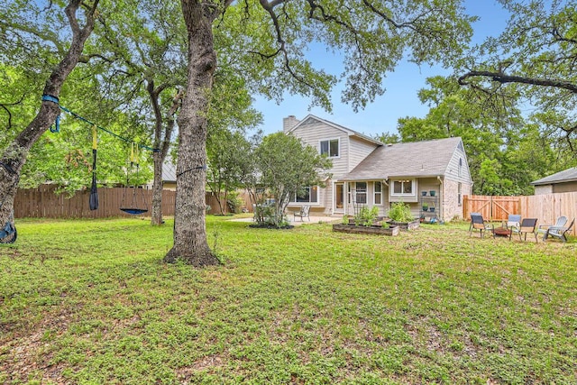 7702 Kincheon Ct, Austin, TX 78749 - rear view of house featuring a chimney, a fenced backyard, and a patio