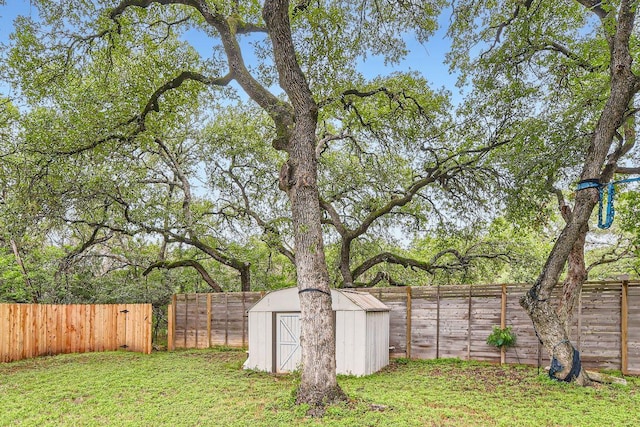 7702 Kincheon Ct, Austin, TX 78749 - fenced backyard featuring a storage unit