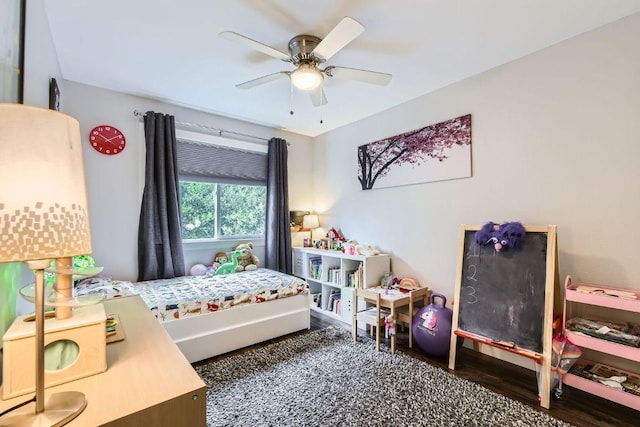 7702 Kincheon Ct, Austin, TX 78749 - bedroom with wood finished floors and a ceiling fan