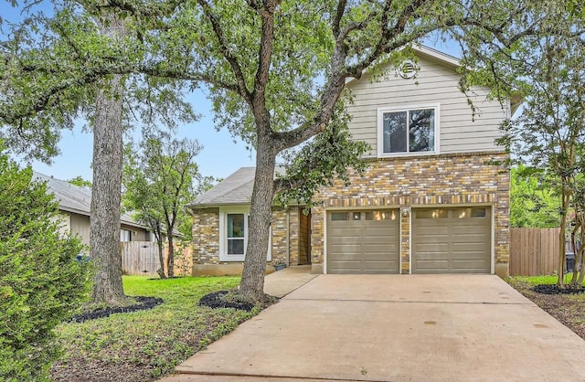 7702 Kincheon Ct, Austin, TX 78749 - traditional-style home featuring a garage, driveway, and brick siding