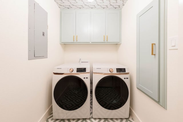 10501 Ronwood Dr, Austin, TX 78750 - laundry area featuring washer and clothes dryer, electric panel, and cabinet space