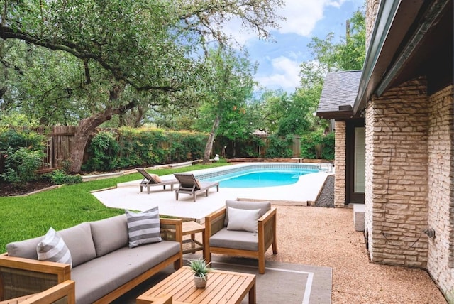 10501 Ronwood Dr, Austin, TX 78750 - view of swimming pool with an outdoor living space, a fenced backyard, and a patio
