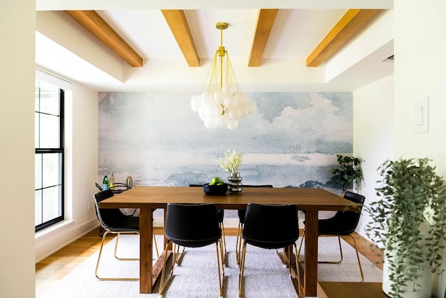 10501 Ronwood Dr, Austin, TX 78750 - dining area featuring a chandelier, wood finished floors, and beamed ceiling