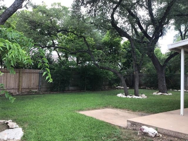 11303 Toledo Dr, Austin, TX 78759 - fenced backyard featuring a patio