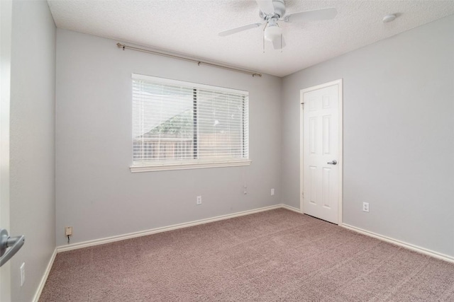 2306 Susan Ln, Leander, TX 78641 - carpeted empty room with a textured ceiling, ceiling fan, and a smoke detector