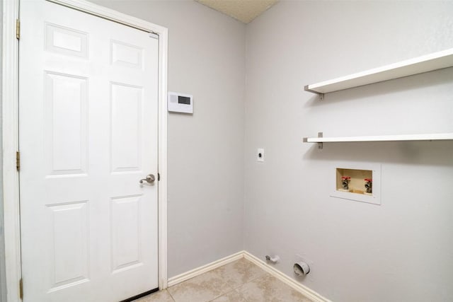 2306 Susan Ln, Leander, TX 78641 - laundry room with electric dryer hookup, washer hookup, light tile patterned floors, and gas dryer hookup