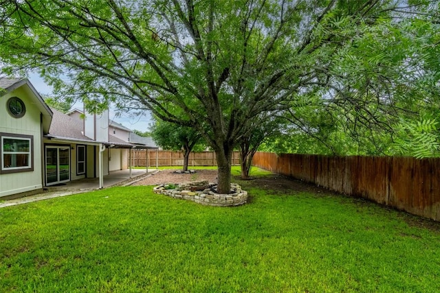 2306 Susan Ln, Leander, TX 78641 - fenced backyard featuring a patio