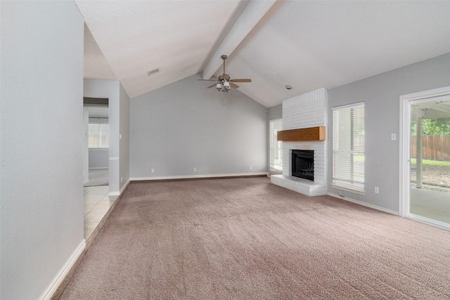 2306 Susan Ln, Leander, TX 78641 - unfurnished living room featuring light carpet, a ceiling fan, a brick fireplace, and plenty of natural light