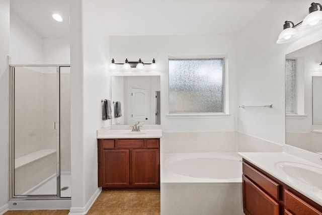 240 Fort Mabry Loop, Georgetown, TX 78628 - full bath featuring a shower stall, a bath, two vanities, and tile patterned floors