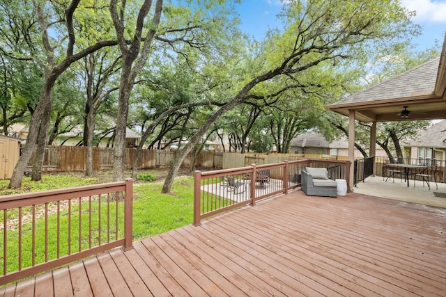 240 Fort Mabry Loop, Georgetown, TX 78628 - wooden deck featuring a fenced backyard, ceiling fan, outdoor dining area, and a storage shed