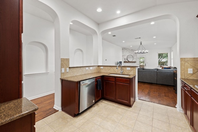240 Fort Mabry Loop, Georgetown, TX 78628 - kitchen featuring dishwasher, open floor plan, decorative backsplash, stone counters, and recessed lighting