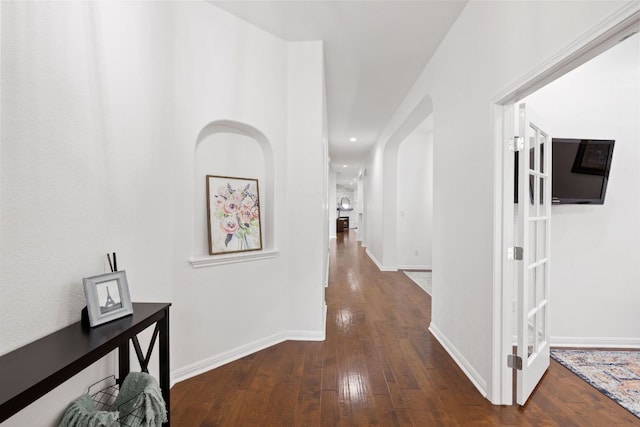 240 Fort Mabry Loop, Georgetown, TX 78628 - hallway featuring dark wood finished floors and recessed lighting