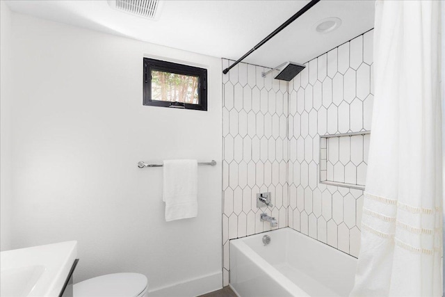 409 W 55th 1/2 St Unit 2, Austin, TX 78751 - full bath featuring shower / bath combo with shower curtain and baseboards