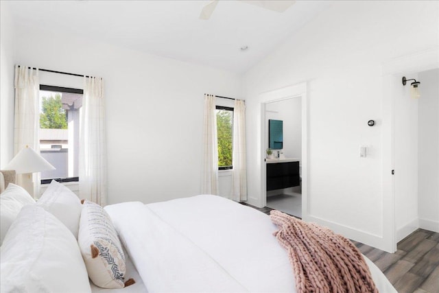 409 W 55th 1/2 St Unit 2, Austin, TX 78751 - bedroom featuring light wood finished floors, connected bathroom, ceiling fan, and lofted ceiling