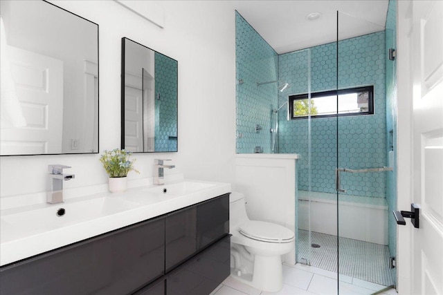 409 W 55th 1/2 St Unit 2, Austin, TX 78751 - bathroom with a stall shower, double vanity, and tile patterned flooring