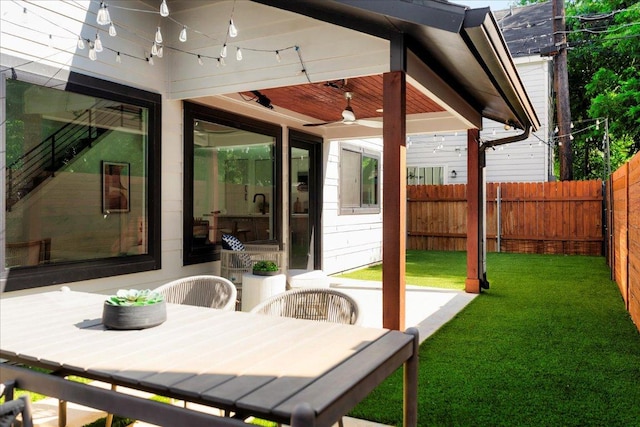 409 W 55th 1/2 St Unit 2, Austin, TX 78751 - fenced backyard featuring ceiling fan
