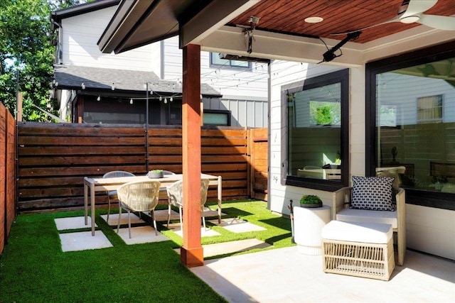 409 W 55th 1/2 St Unit 2, Austin, TX 78751 - fenced backyard with a patio and ceiling fan