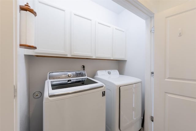 4001 Teaff St, Austin, TX 78723 - laundry area with cabinet space and washer and clothes dryer
