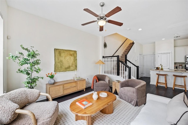 4001 Teaff St, Austin, TX 78723 - living area with stairs, recessed lighting, dark wood finished floors, and a ceiling fan