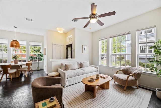 4001 Teaff St, Austin, TX 78723 - living area with a ceiling fan and wood finished floors