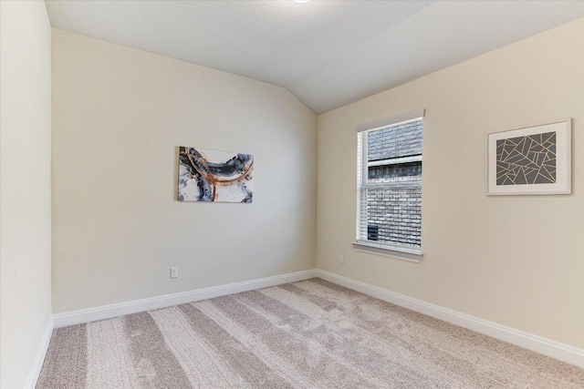18211 Winnow Way, Pflugerville, TX 78660 - unfurnished room featuring light carpet and lofted ceiling