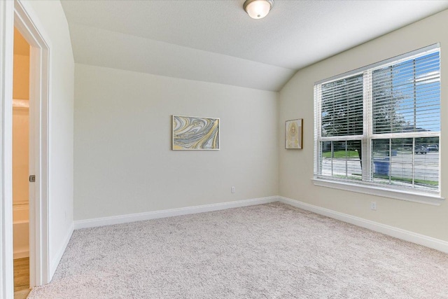 18211 Winnow Way, Pflugerville, TX 78660 - carpeted spare room with vaulted ceiling and baseboards