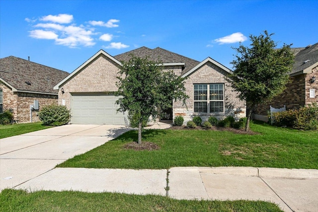 18211 Winnow Way, Pflugerville, TX 78660 - view of front of home featuring brick siding, an attached garage, concrete driveway, and a front yard
