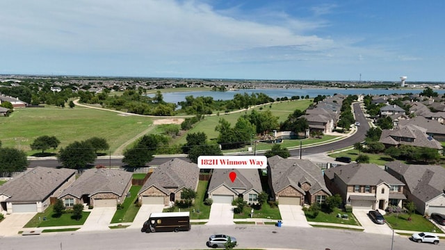 18211 Winnow Way, Pflugerville, TX 78660 - aerial perspective of suburban area with a nearby body of water