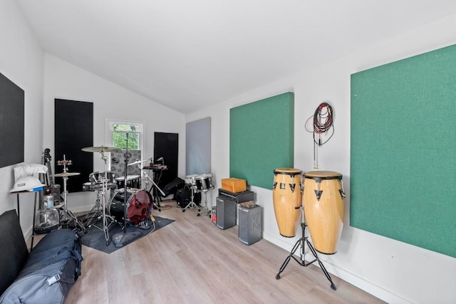 4304 Adelphi Ln, Austin, TX 78727 - rec room with wood finished floors and lofted ceiling