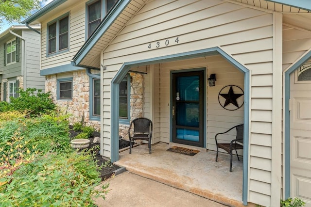 4304 Adelphi Ln, Austin, TX 78727 - doorway to property with stone siding
