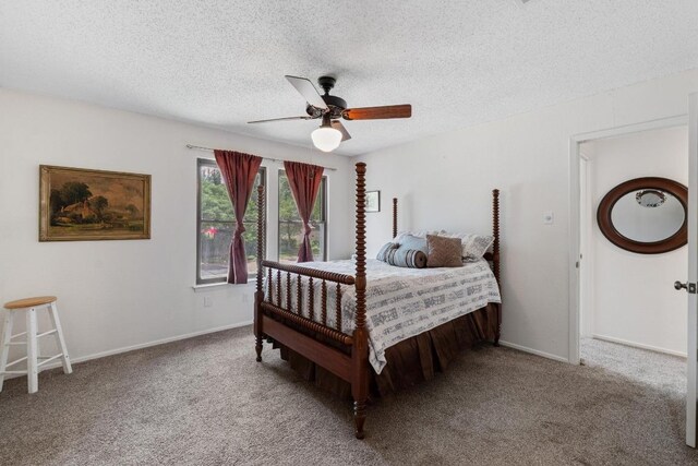 4304 Adelphi Ln, Austin, TX 78727 - carpeted bedroom with a textured ceiling and ceiling fan