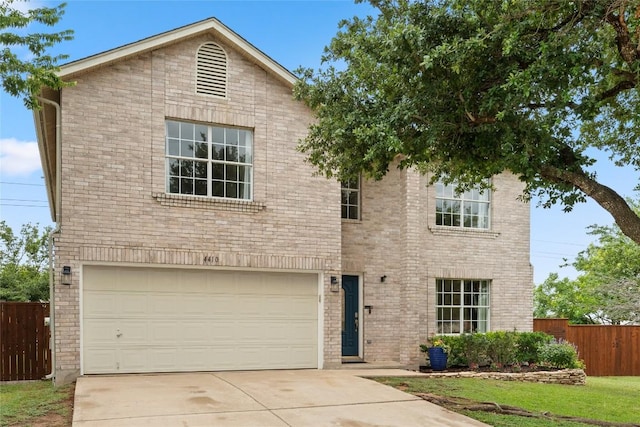 4410 Cisco Valley Dr, Round Rock, TX 78664 - view of front of house with concrete driveway, a garage, and brick siding