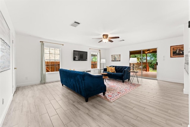 4410 Cisco Valley Dr, Round Rock, TX 78664 - living area with ceiling fan and light wood-style flooring