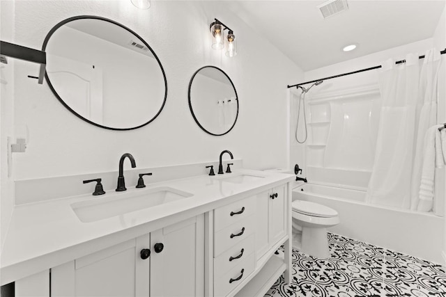 4410 Cisco Valley Dr, Round Rock, TX 78664 - bathroom with double vanity, shower / bathtub combination with curtain, tile patterned floors, and recessed lighting